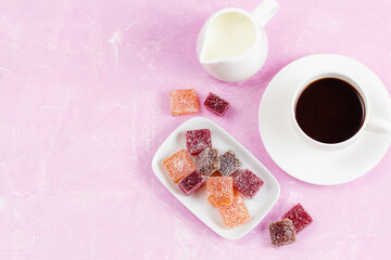 Homemade marmalade with coffee on pink
