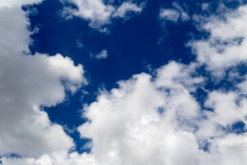 Beautiful clouds against blue sky as background