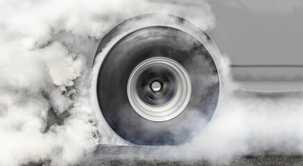 Drag racing car burns tire for the race 