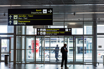 Signposts at the airport entrance