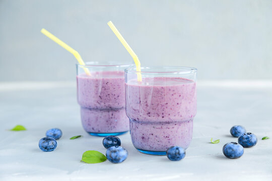Fresh Cold Blueberry Smoothie in Glass