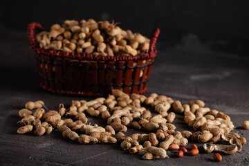Groundnut peanuts on a dark background