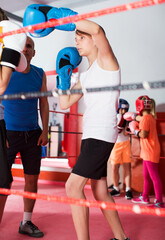 Fototapeta na wymiar Children training on boxing ring