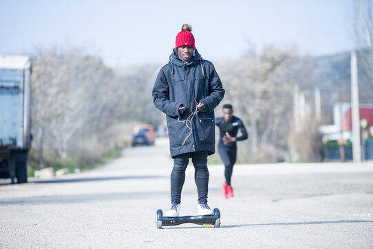 Man riding hoverboard outdoors