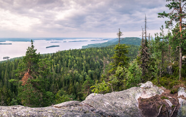 Fototapeta premium Scenic landscape with lake and sunset at evening in Koli, national park.