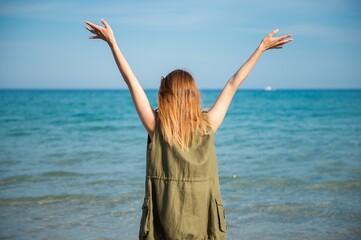 Beautiful young girl at the beach