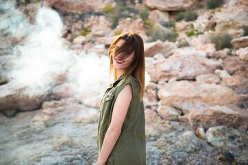 Beautiful girl outdoor with with smoke bomb
