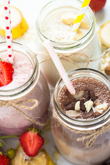 Banana chocolate and strawberry milkshakes