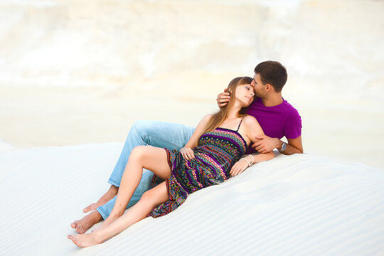 Lovers kissing on the barkhan
