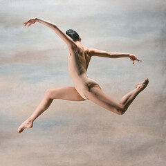 Young beautiful modern style dancer jumping on a studio background
