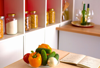 Pile of organic vegetables on a wooden table