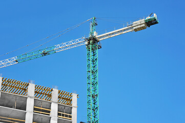 Crane and highrise construction site