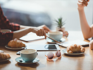 cropped view of people having lunch at meeting in cafe, business lunch concept