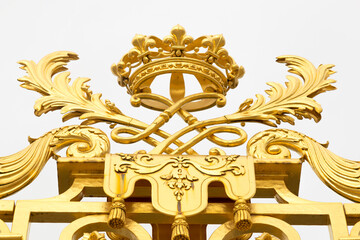 The golden gate of the Palace of Versailles, or Chateau de Versailles, or simply Versailles, in France
