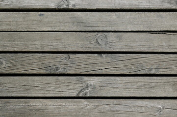Fototapeta premium Old dark grey wooden fence background texture