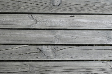 Old dark grey wooden fence background texture
