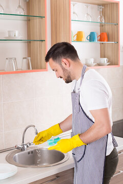 Man Washing Dishes