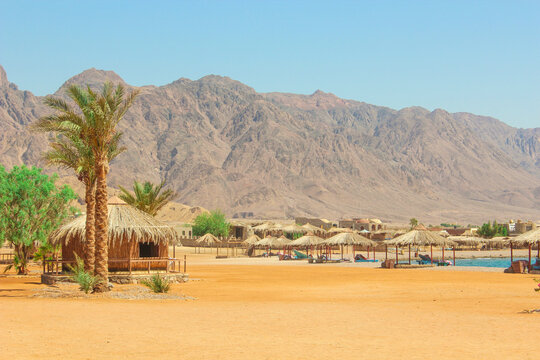 Cottage in a Camp in Sinai, Taba desert with the Background of the Sea and Mountains.