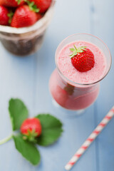 Delicious strawberry smoothie with milk, prepared with fresh strawberries.