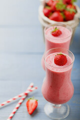 Delicious strawberry smoothie with milk, prepared with fresh strawberries.