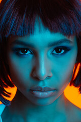 close up portrait of attractive african american girl looking at camera