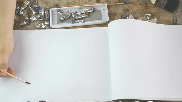 Woman  brush stoke with no color for your presentation or text on notebook  (presentation concept)