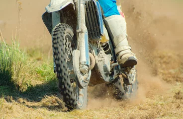 Photo sur Plexiglas Sport automobile Pilote de motocross professionnel sur la route.