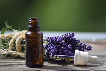 Lavender aromatic oil with lavender flowers