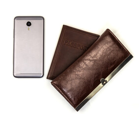 Cell phone with grey back with leather wallet and passport