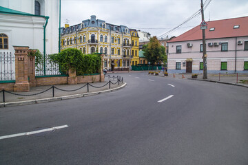The road winds through the old city quarter