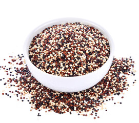 Quinoa seeds in ceramic  bowl on white background