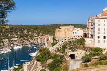 Fototapeta na wymiar Corsica, France. Bonifacio: a picturesque view of the port, the city and the ancient fortress
