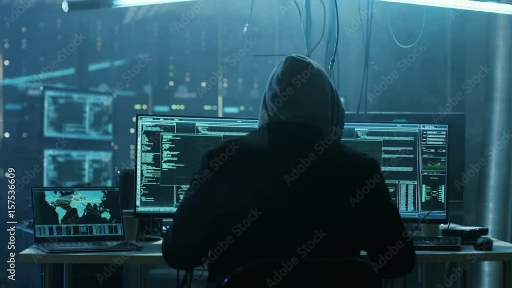 Poster Dangerous Hooded Hacker Breaks into Government Data Servers and Infects Their System with a  Virus. Shot on RED EPIC-W 8K Helium Cinema Camera.