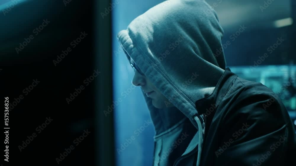 Aufkleber Dangerous Hooded Hacker Breaks into Government Data Servers and Infects Their System with a  Virus. Shot on RED EPIC-W 8K Helium Cinema Camera.
