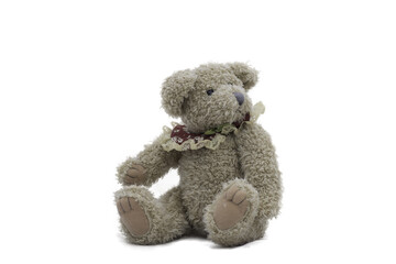 teddy bear sitting isolated on white background