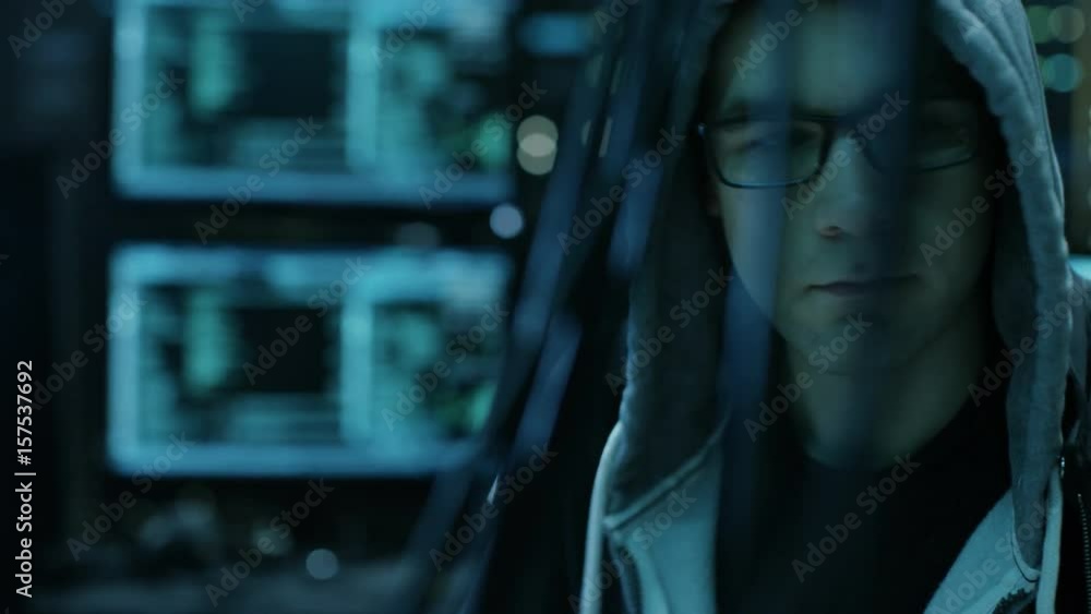 Aufkleber Dangerous Hooded Hacker Breaks into Government Data Servers and Infects Their System with a  Virus. Shot on RED EPIC-W 8K Helium Cinema Camera.