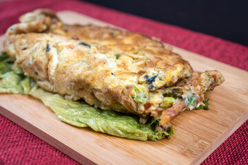 Japanese cuisine - omelet rice warpped on a plate