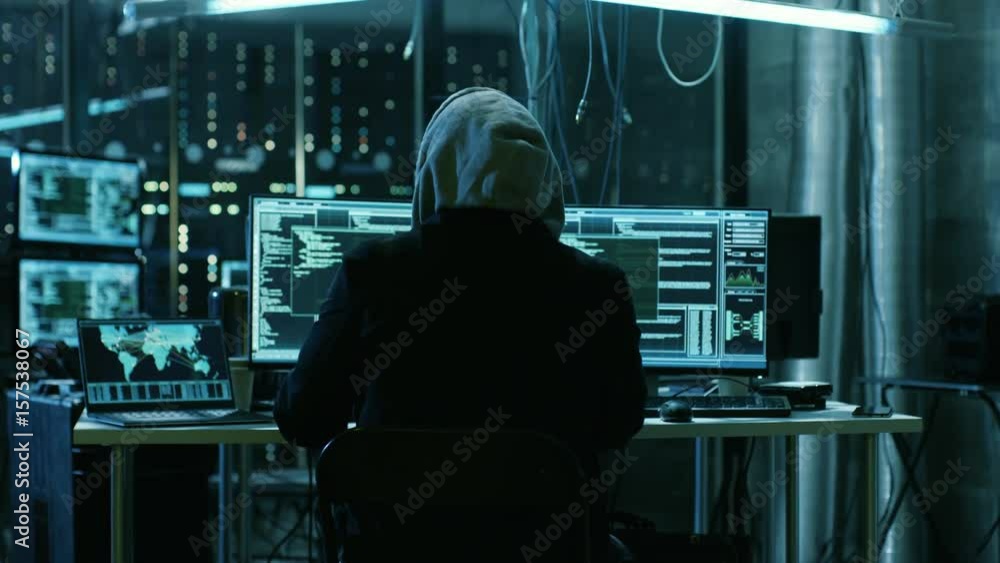 Aufkleber Dangerous Hooded Hacker Breaks into Government Data Servers and Infects Their System with a  Virus. Shot on RED EPIC-W 8K Helium Cinema Camera.