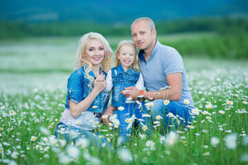 happy family having fun outdoors. Portrait of happy family in countryside Happy people outdoors wearing jeans enjoying time together