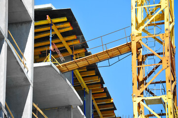 Crane and highrise construction site
