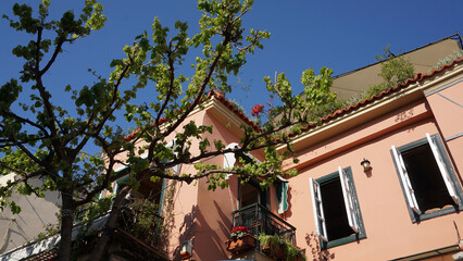 Photo from picturesque Plaka area in center of Athens and Roman Forum archaeological site, Attica, Greece