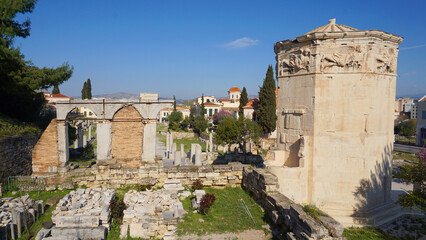 Photo from picturesque Plaka area in center of Athens and Roman Forum archaeological site, Attica, Greece