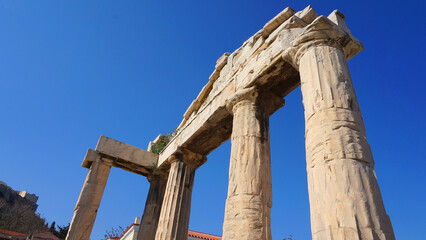 Photo from picturesque Plaka area in center of Athens and Roman Forum archaeological site, Attica, Greece