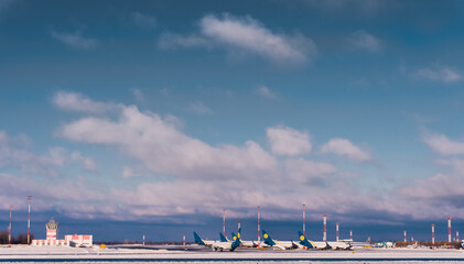 Fototapeta na wymiar Winter airport of Ukraine, Borispol. Runway with passenger aircraft