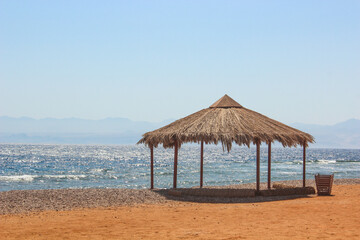 Cottage in a Camp in Sinai, Taba desert with the Background of the Sea and Mountains.