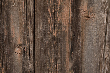 Red color of a wooden texture. Abstract background