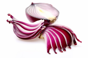 Onion red cut in quarters and sliced neatly making waves