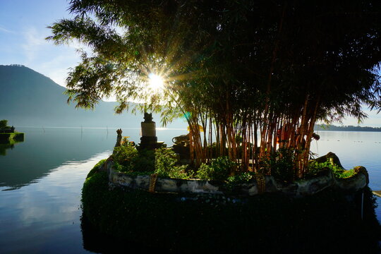 Morning view at Ulun Danu temple with bamboo tree.