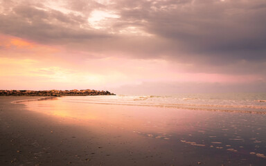 Dramatic coastline sunset with twilight time in yellow and magenta tone : Seascape