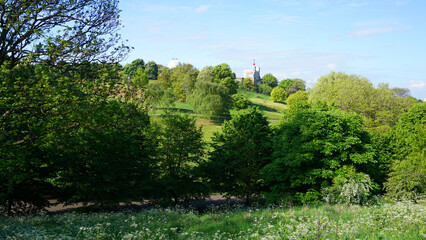 Photo from Greenwich Park and Observatory with views to Canary Warf in isle of Dogs on a sunny spring morning, London, United Kingdom